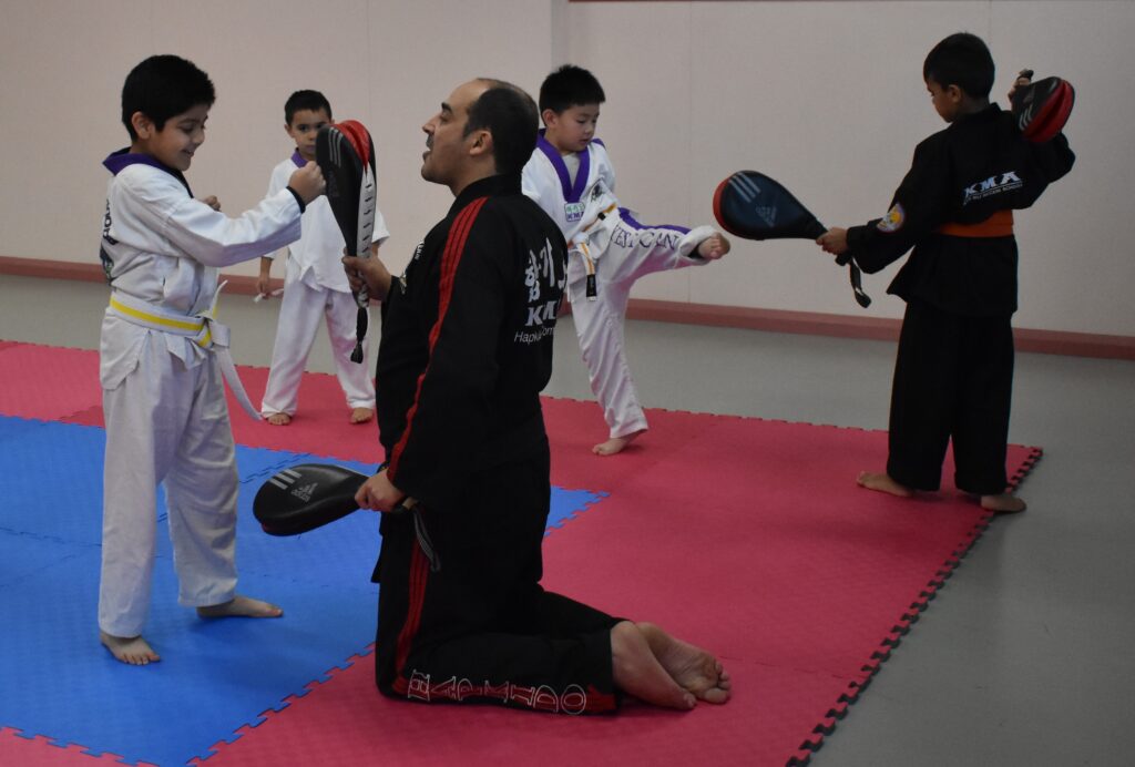 Kids boxing and kicking
Learning control and co-ordination
